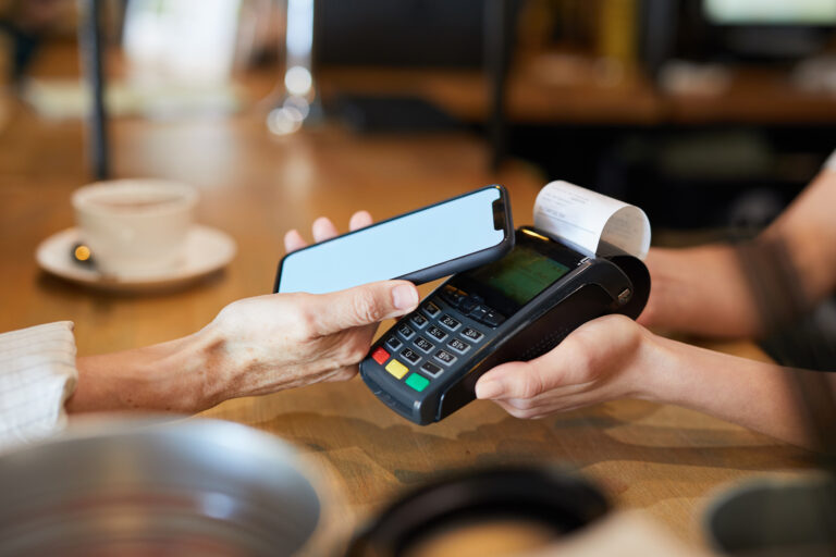 A customer paying bills through POS.