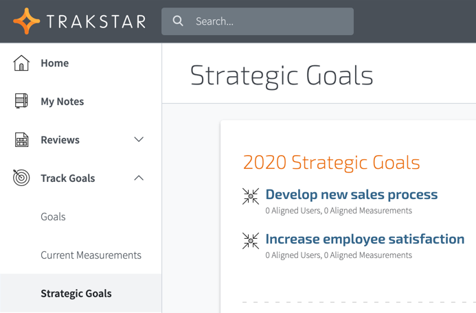 Trakstar dashboard displays strategic goals feature with sample goals for sales processes and employee satisfaction.