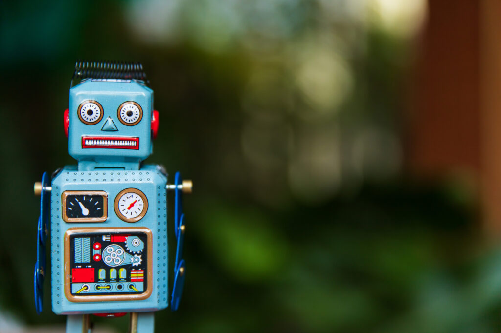 A vintage blue tin robot toy.